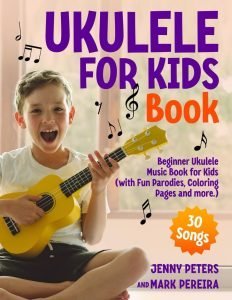 Happy child learning to play the ukulele. Let's learn ukulele!