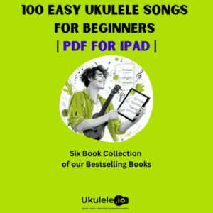 man plying ukulele and reading ipad